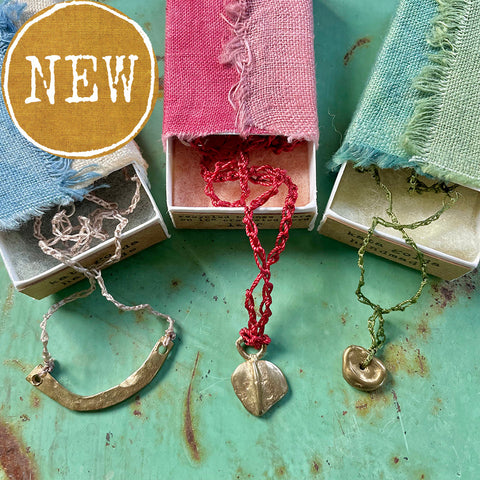 choker necklace in a plant-dyed matchbox: basin, leaf & pebble