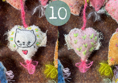 heavily stitched dog & cat wool felt hearts (fundraiser for pasadena humane)