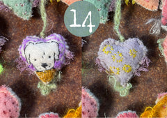 heavily stitched dog & cat wool felt hearts (fundraiser for pasadena humane)