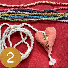 beaded plant-dyed wool felt hearts on silk cordage