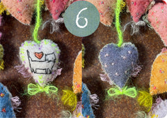 heavily stitched dog & cat wool felt hearts (fundraiser for pasadena humane)