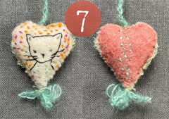 new batch! heavily stitched dog & cat wool felt hearts (fundraiser for pasadena humane)