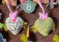 heavily stitched dog & cat wool felt hearts (fundraiser for pasadena humane)