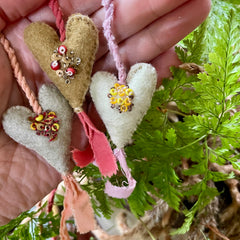 beaded plant-dyed wool felt hearts on silk cordage