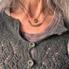 choker necklace in a plant-dyed matchbox: basin, leaf & pebble