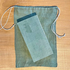 daily practice hand-bound journal (my thickest journal ever) in a plant-dyed linen bag