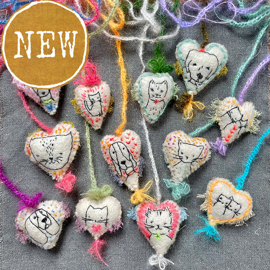 new batch! heavily stitched dog & cat wool felt hearts (fundraiser for pasadena humane)