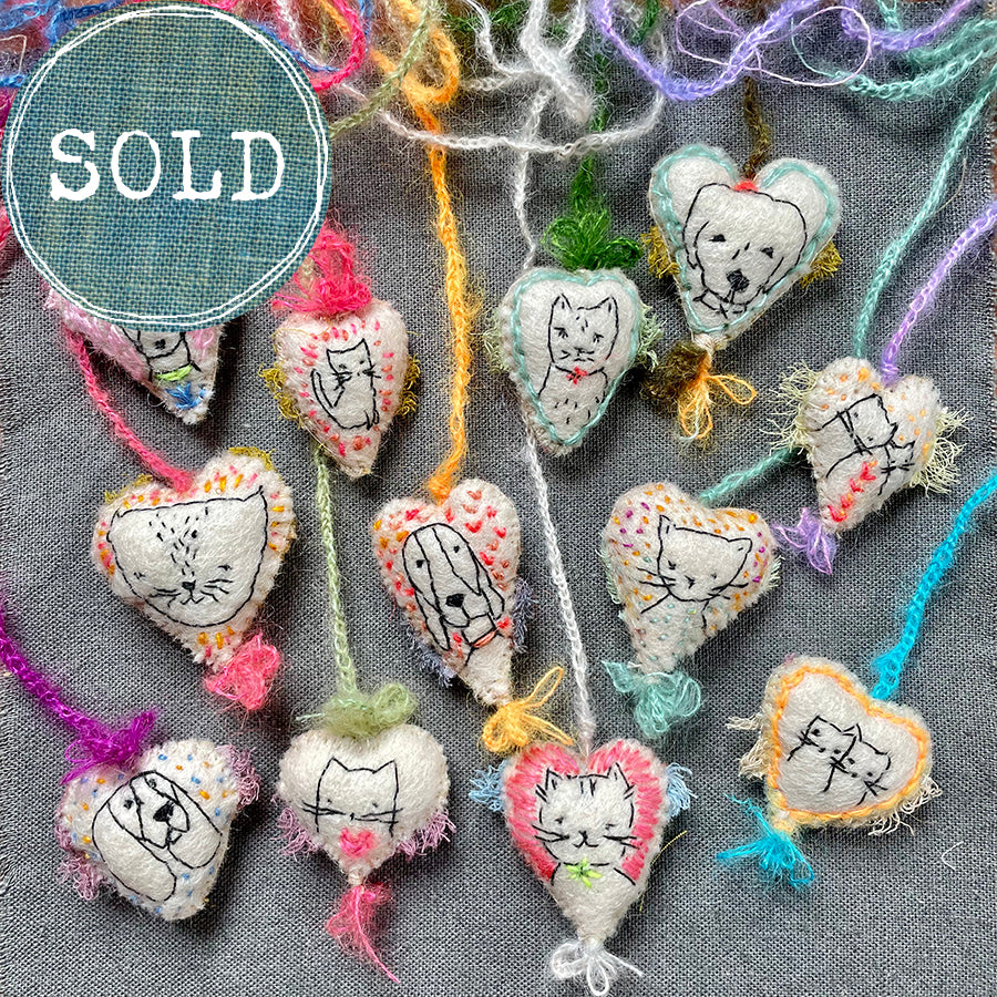 new batch! heavily stitched dog & cat wool felt hearts (fundraiser for pasadena humane)