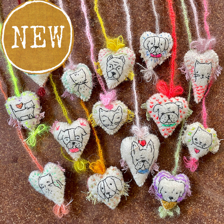 heavily stitched dog & cat wool felt hearts (fundraiser for pasadena humane)