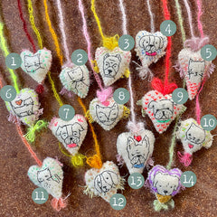 heavily stitched dog & cat wool felt hearts (fundraiser for pasadena humane)