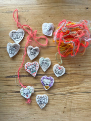 heavily stitched dog & cat wool felt hearts (fundraiser for pasadena humane)