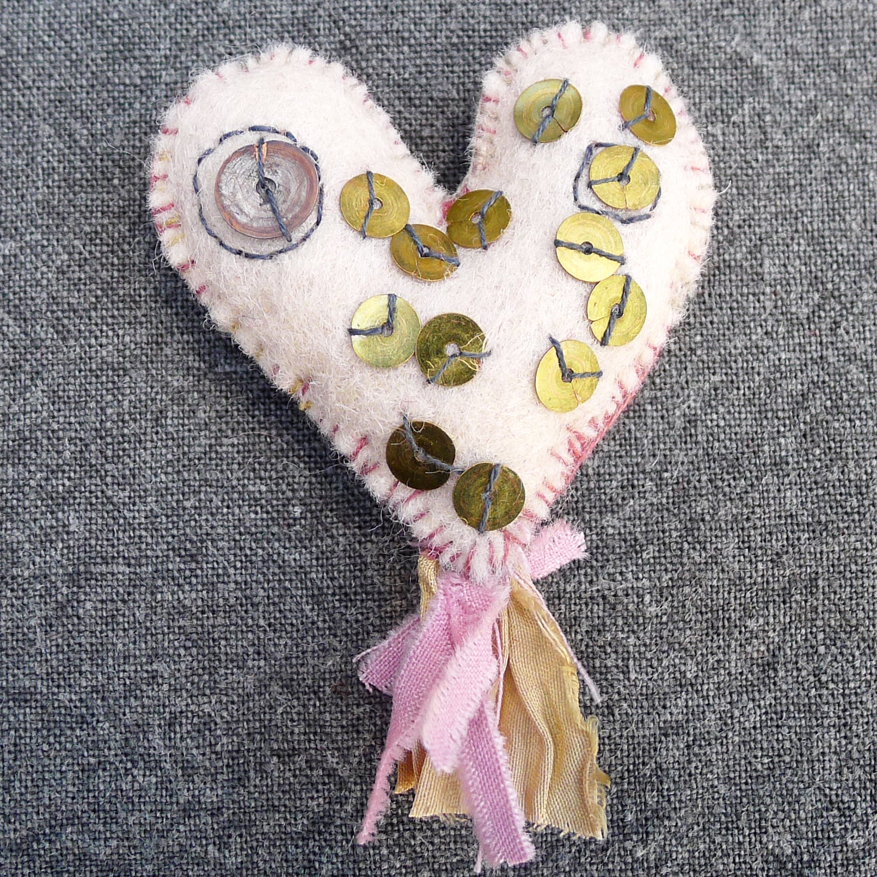 heavily stitched wool felt hearts – kata golda handmade